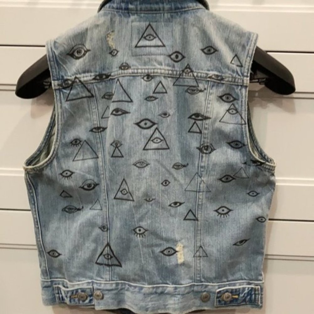 Levi's Distressed Denim Vest With eye graphics on the back